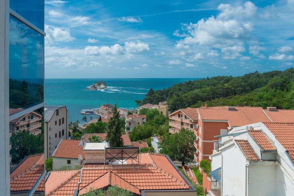 View over Petrovac rooftops and the Adriatic Sea